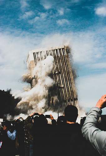 demolition people taking photo of collapsing building frankfort